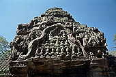 Ta Prohm temple - in sculpted frontons most of Buddha images have been erased